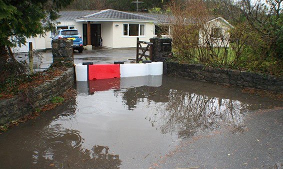 household saved by flood barrier